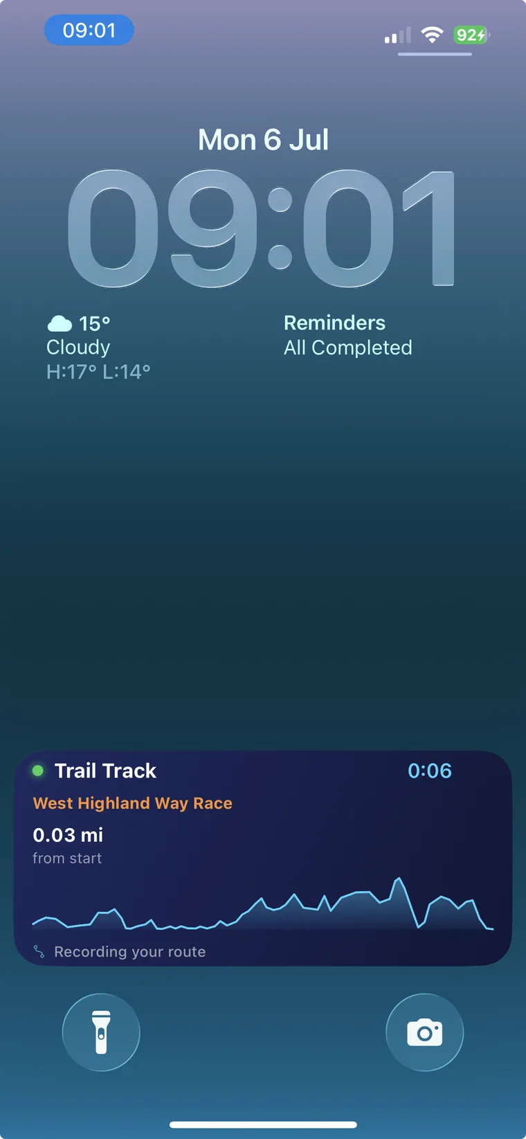 Trail Track lock screen Live Activity showing distance from start, the route elevation profile and a running timer